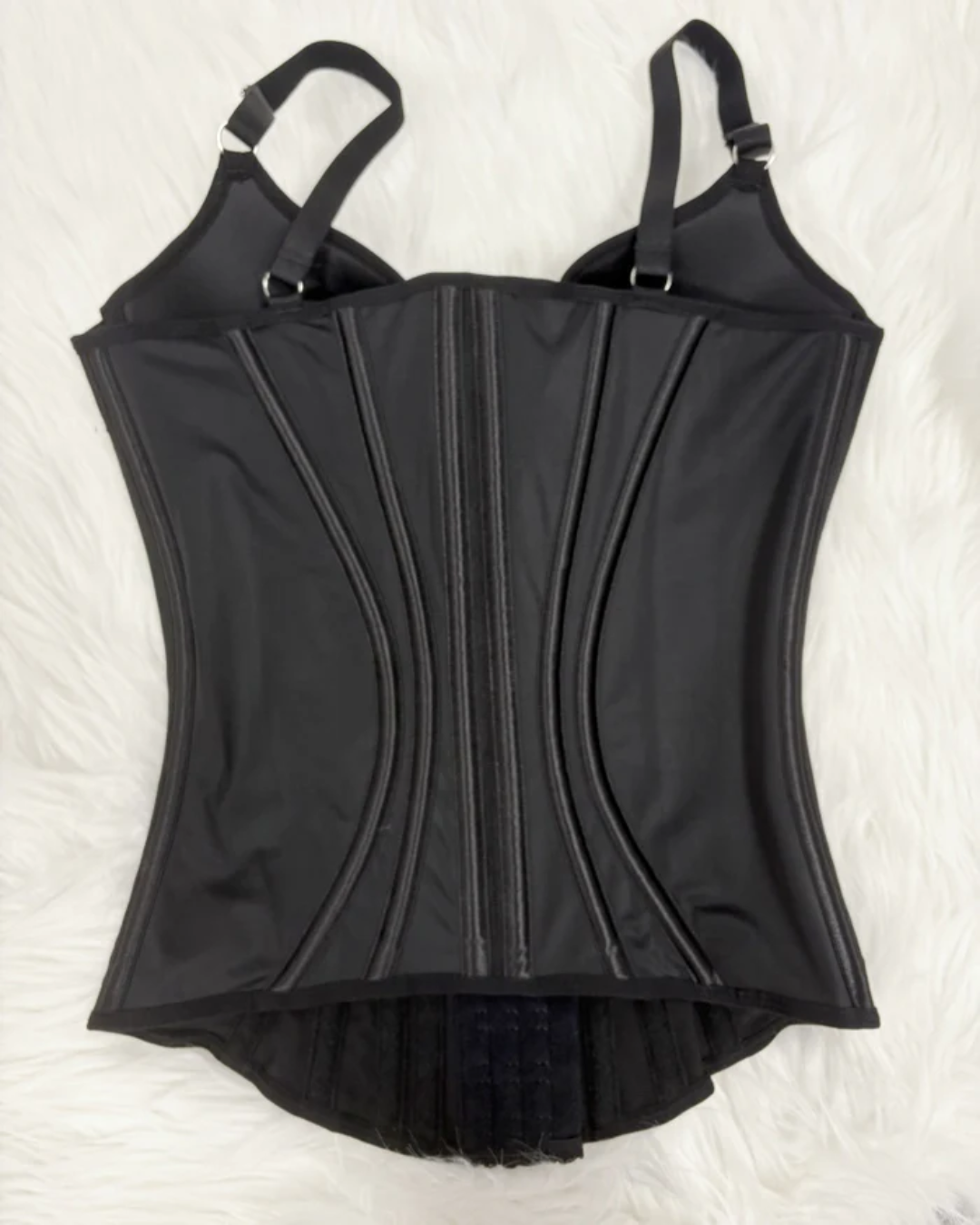 Fita espartilho colombiana com reforço para maior controlo abdominal.