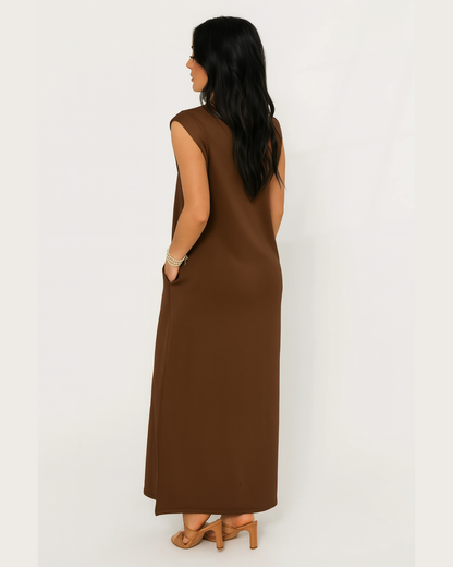 Vestido largo e ajustado com bolsos laterais 