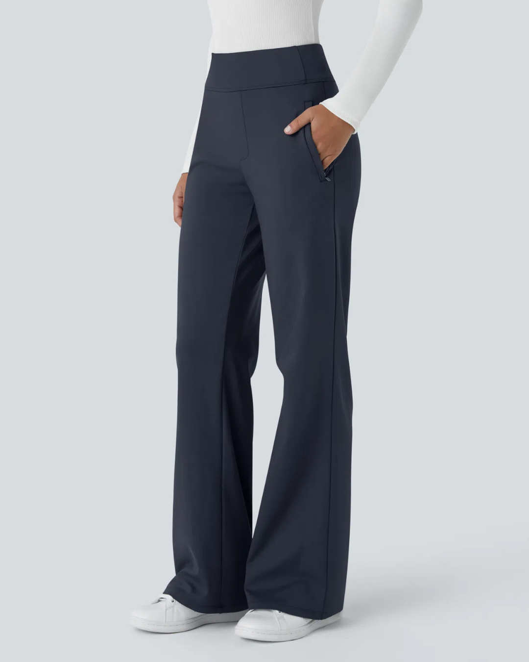 Calça legging de cintura subida para trabalho com bolsos laterais e ténis de corrida para mulher. 