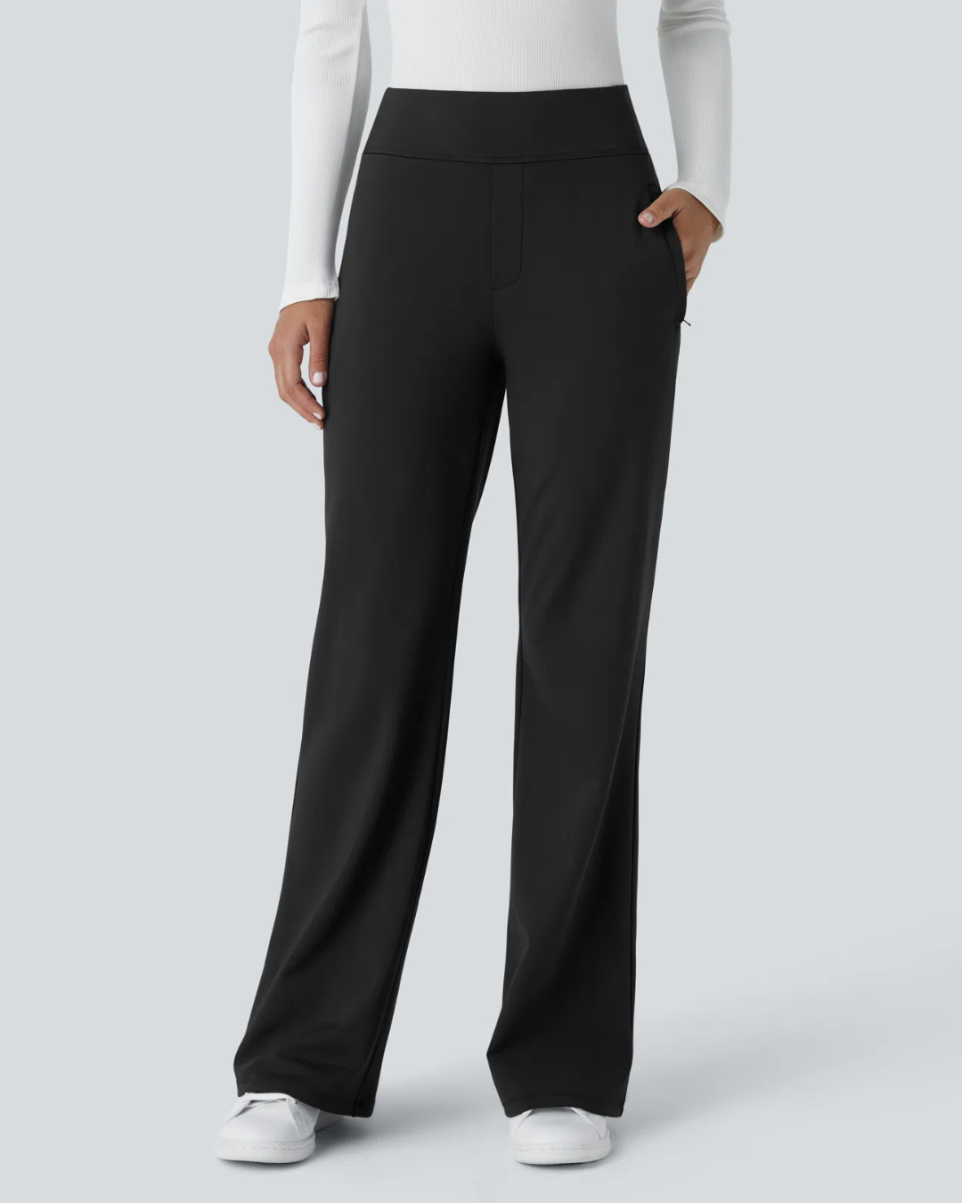 Calça legging de cintura subida para trabalho com bolsos laterais e ténis de corrida para mulher. 